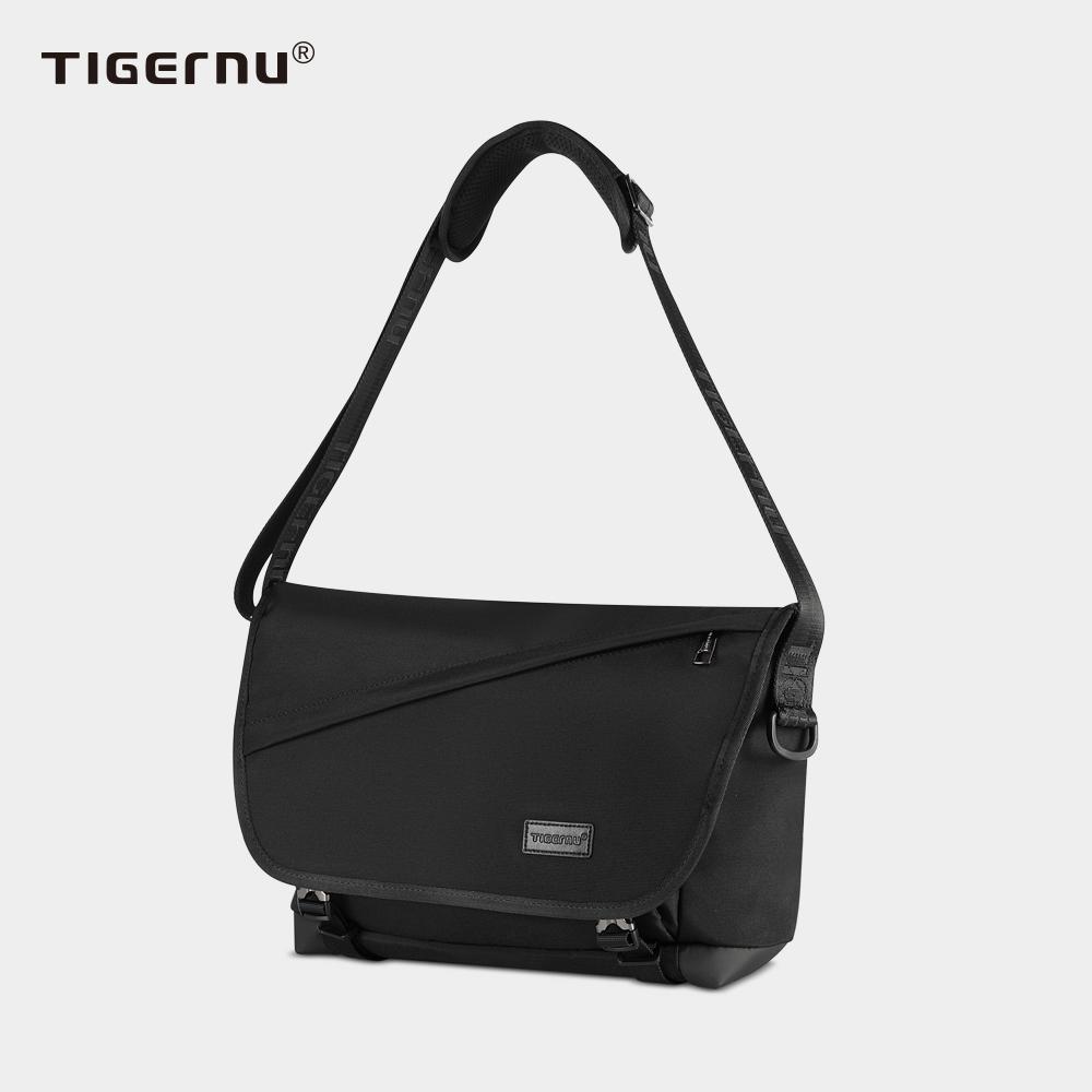 Front view of a black crossbody bag with model T-S8098